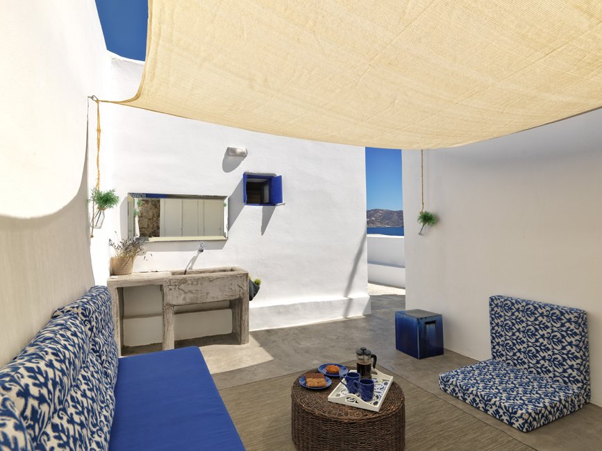 aria hotels-kimolos-psathi blue alpha-outdoor seating area.jpg