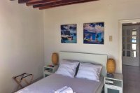 aria hotels-kimolos-psathi blue gamma- bedroom.jpg